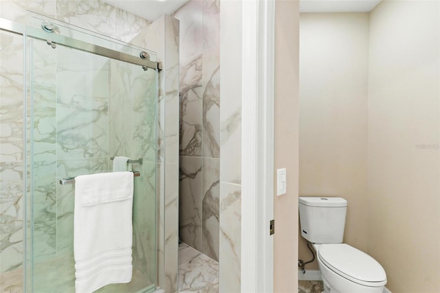 6152 Topsail Rd, Lady Lake, FL 32159 - bathroom with marble finish floor, toilet, and a marble finish shower