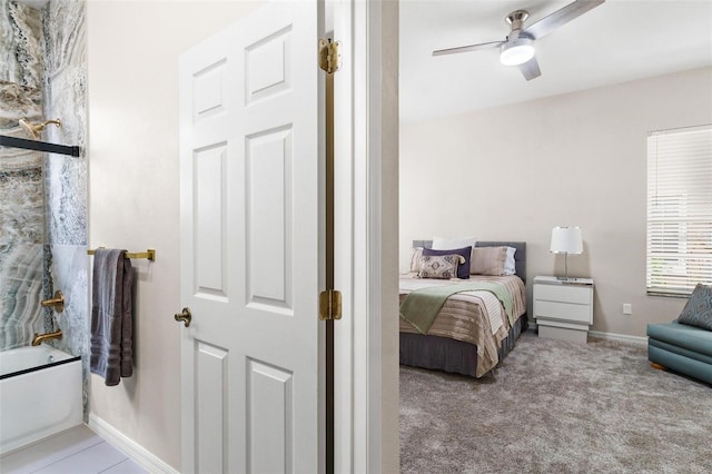 6152 Topsail Rd, Lady Lake, FL 32159 - carpeted bedroom featuring baseboards and ceiling fan