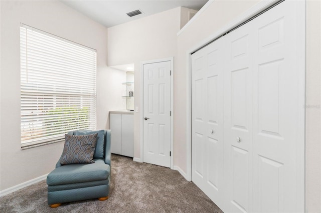 6152 Topsail Rd, Lady Lake, FL 32159 - living area featuring carpet floors, baseboards, and visible vents