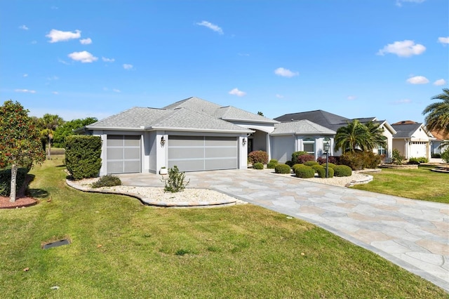 view of front of home with a front lawn, concrete driveway, roof with shingles, stucco siding, and an attached garage
