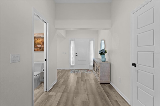 6444 Mcknight Loop, The Villages, FL 34762 - foyer with light wood-type flooring and baseboards