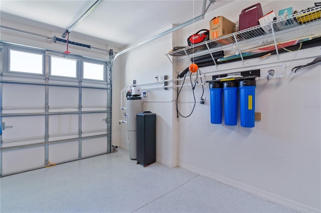 6444 Mcknight Loop, The Villages, FL 34762 - garage featuring baseboards