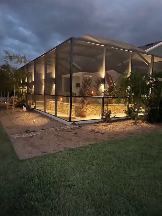 6444 Mcknight Loop, The Villages, FL 34762 - view of home's exterior with glass enclosure