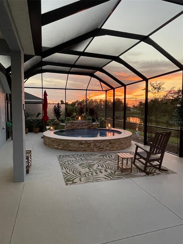 6444 Mcknight Loop, The Villages, FL 34762 - view of patio with an outdoor hot tub, a lanai, and a fire pit