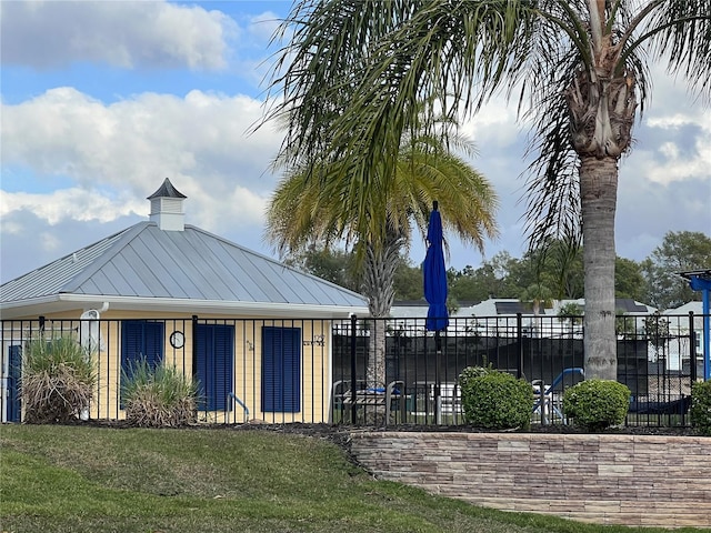 999 Fiesta Key Cir, Lady Lake, FL 32159 - view of home's community featuring a yard and fence