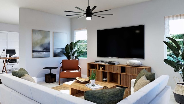 living room with baseboards and a ceiling fan