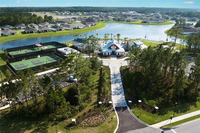 bird's eye view with a residential view and a water view