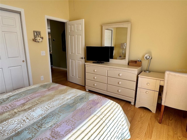 bedroom with light wood-style flooring