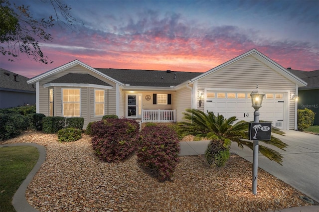 1417 Forest Acres Dr, The Villages, FL 32162 - ranch-style home with a porch, concrete driveway, a garage, and roof with shingles