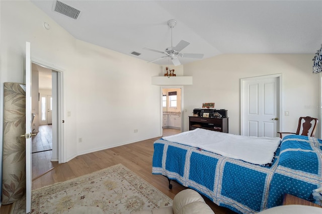 1417 Forest Acres Dr, The Villages, FL 32162 - bedroom featuring visible vents, wood finished floors, connected bathroom, lofted ceiling, and ceiling fan