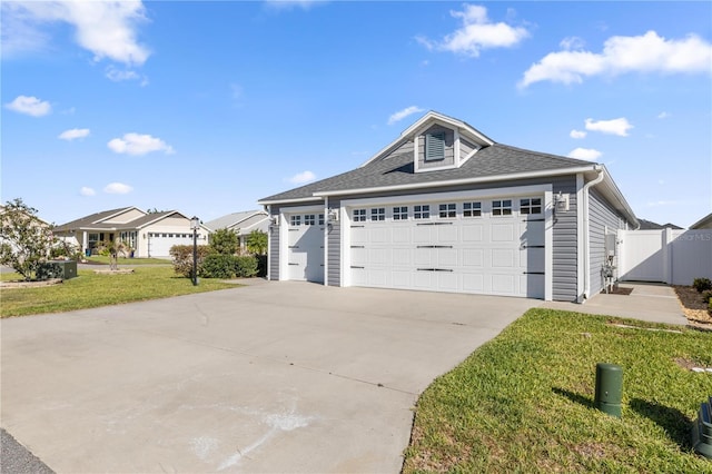 1853 Pasqua Pl, The Villages, FL 32163 - ranch-style house featuring a front yard, a shingled roof, an attached garage, fence, and concrete driveway