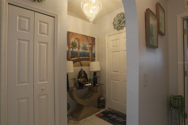 2442 Foxhollow Rd, Tavares, FL 32778 - foyer with a notable chandelier and visible vents