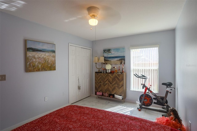 2442 Foxhollow Rd, Tavares, FL 32778 - workout area with baseboards and a ceiling fan