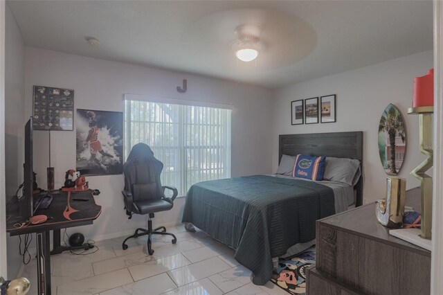 2442 Foxhollow Rd, Tavares, FL 32778 - bedroom featuring marble finish floor and a ceiling fan