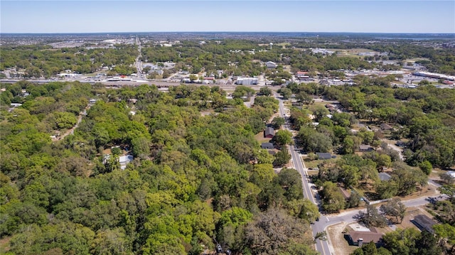 801 Kilgore St, Wildwood, FL 34785 - aerial view featuring a forest view