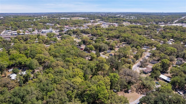 801 Kilgore St, Wildwood, FL 34785 - drone / aerial view featuring a wooded view