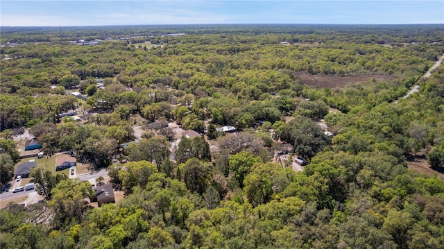 801 Kilgore St, Wildwood, FL 34785 - birds eye view of property with a wooded view
