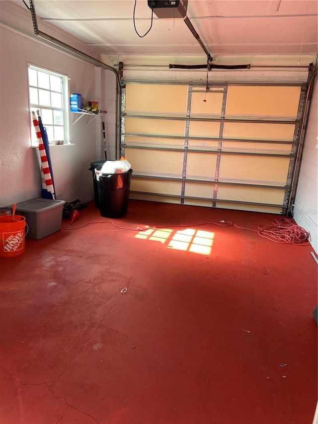 garage featuring a garage door opener