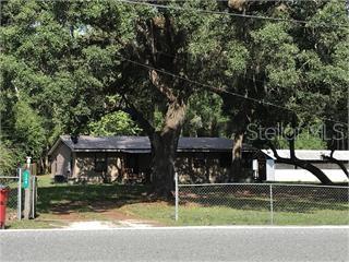 136 S Commercial St, Coleman, FL 33521 - view of front of property featuring fence