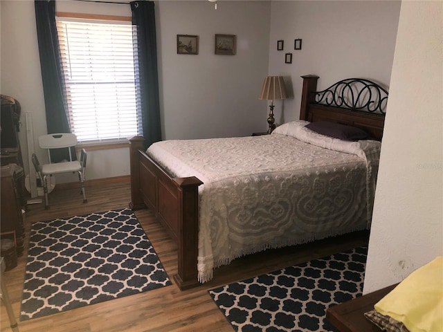 136 S Commercial St, Coleman, FL 33521 - bedroom featuring wood finished floors