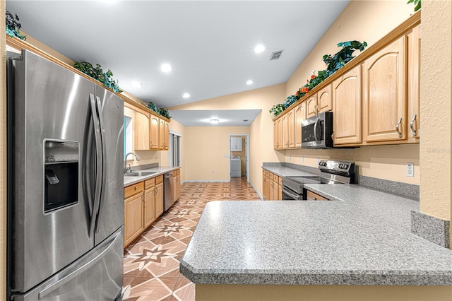 kitchen with recessed lighting, a sink, light brown cabinetry, vaulted ceiling, and appliances with stainless steel finishes