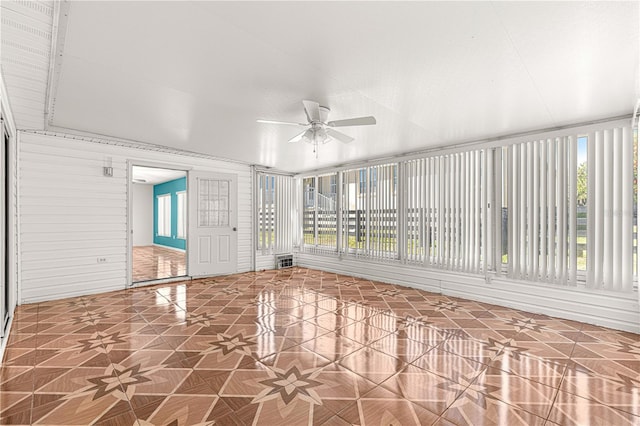 unfurnished sunroom with a wealth of natural light