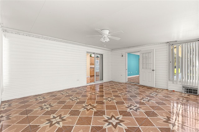 unfurnished room featuring ceiling fan