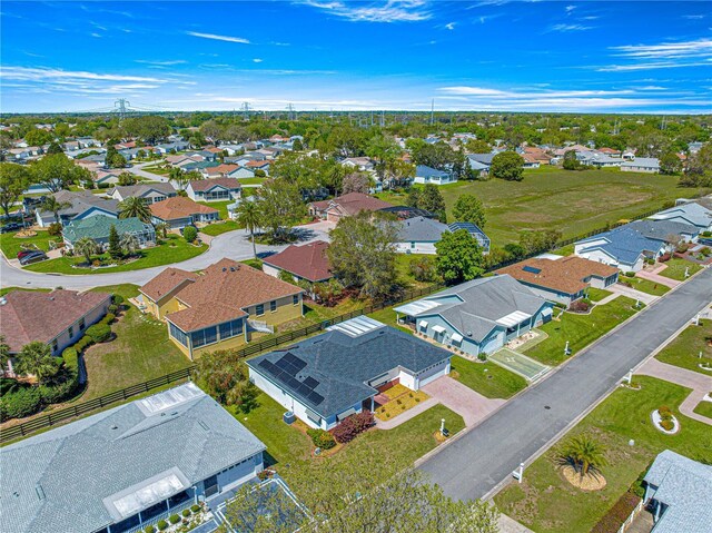 birds eye view of property with a residential view