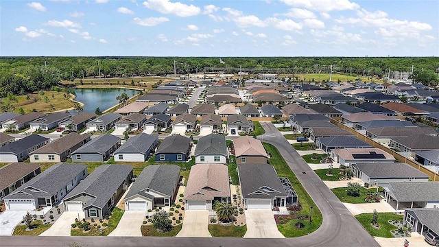 3557 Cochran St, The Villages, FL 32163 - aerial view featuring a water view and a residential view