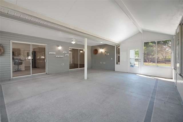 2433 Tamarindo Dr, The Villages, FL 32162 - unfurnished sunroom with a ceiling fan and beam ceiling