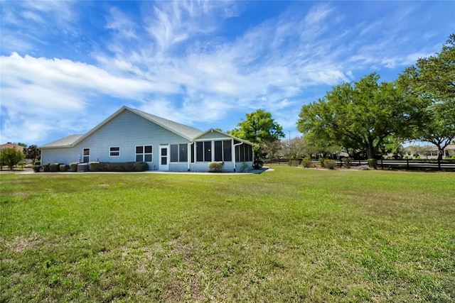 2433 Tamarindo Dr, The Villages, FL 32162 - back of property with a lawn