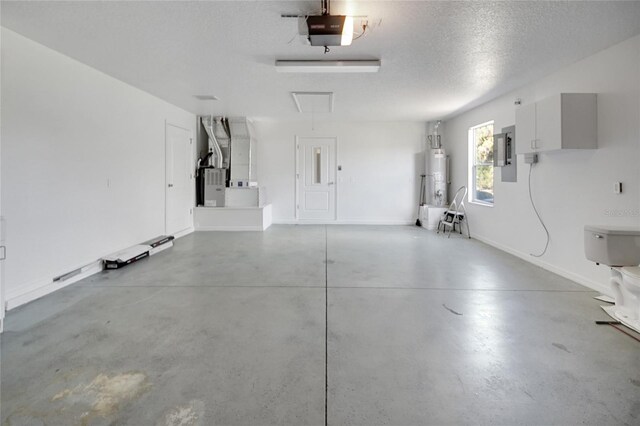 2433 Tamarindo Dr, The Villages, FL 32162 - garage featuring water heater, baseboards, a garage door opener, heating unit, and electric panel