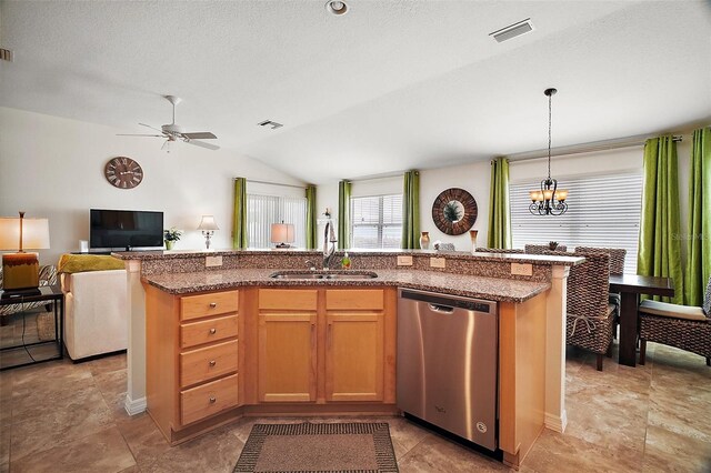 1093 Peninsula St, The Villages, FL 32162 - kitchen with stainless steel dishwasher, a sink, open floor plan, lofted ceiling, and stone countertops