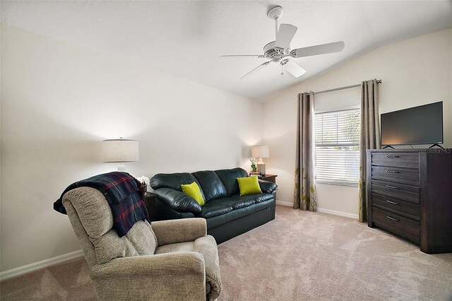 1093 Peninsula St, The Villages, FL 32162 - living area with light carpet, lofted ceiling, baseboards, and ceiling fan