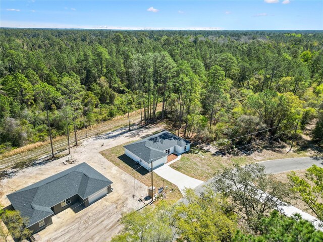 drone / aerial view with a forest view