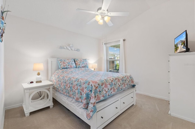 5829 Tupelo Ter, The Villages, FL 32163 - bedroom with light colored carpet, baseboards, ceiling fan, and vaulted ceiling