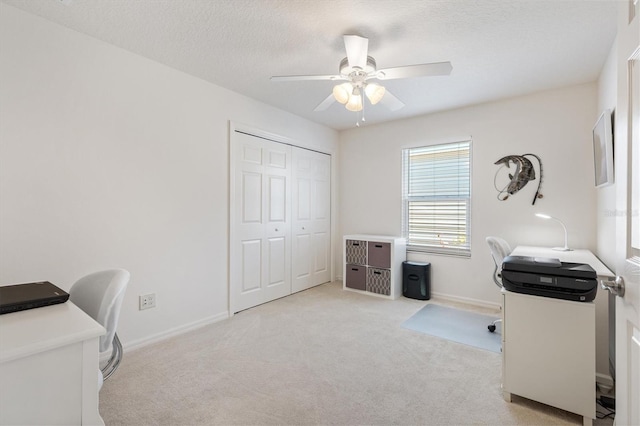 5829 Tupelo Ter, The Villages, FL 32163 - office space with ceiling fan, carpet, baseboards, and a textured ceiling