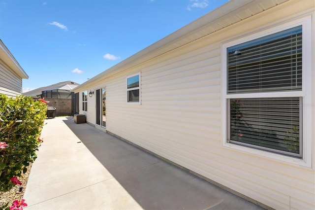 5829 Tupelo Ter, The Villages, FL 32163 - view of home's exterior with a patio area
