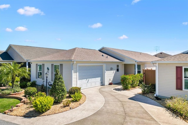 5829 Tupelo Ter, The Villages, FL 32163 - ranch-style home with driveway, an attached garage, roof with shingles, and fence