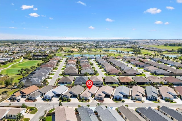 5829 Tupelo Ter, The Villages, FL 32163 - aerial view of property and surrounding area with nearby suburban area, a large body of water, and a golf club