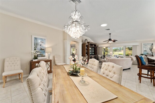 dining space with ornamental molding, light tile patterned flooring, visible vents, ceiling fan, and decorative columns