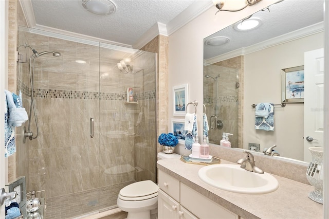 bathroom featuring toilet, a textured ceiling, ornamental molding, and a stall shower