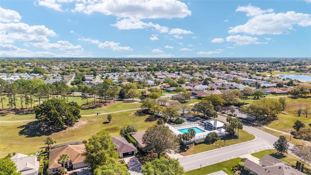 aerial view with a residential view and view of golf course