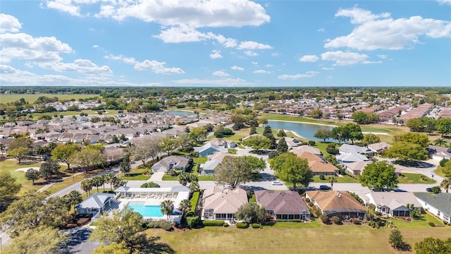 aerial view with a water view and a residential view
