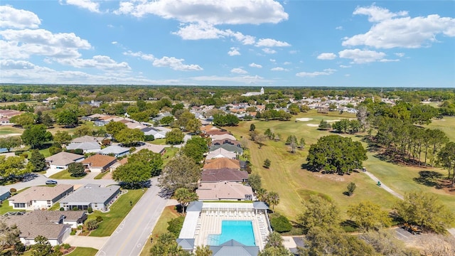 birds eye view of property featuring golf course view and a residential view