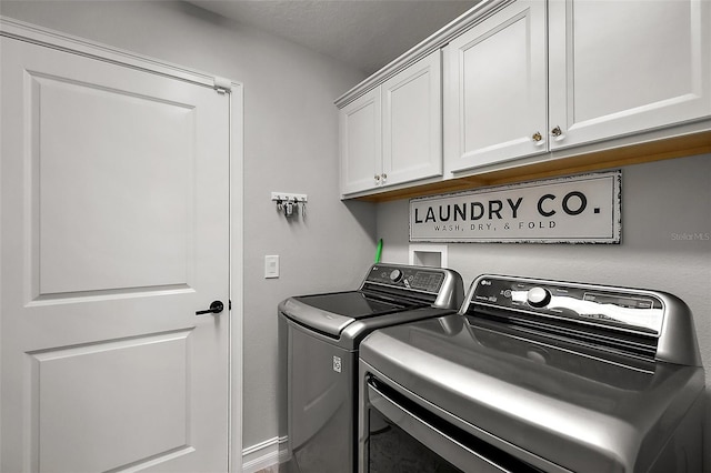 5557 Hawkins Dr, The Villages, FL 32163 - laundry room with cabinet space and washing machine and dryer
