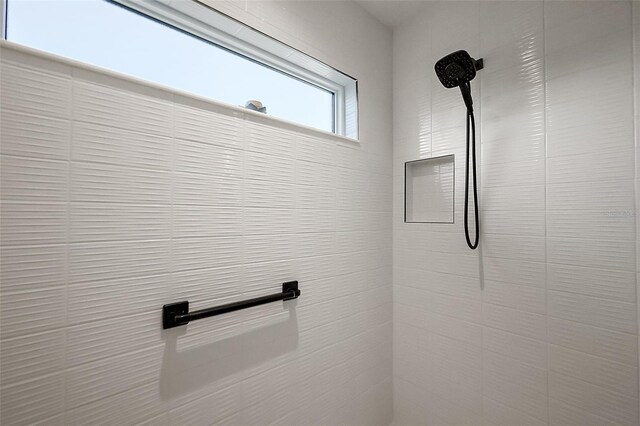 5557 Hawkins Dr, The Villages, FL 32163 - room details with tiled shower