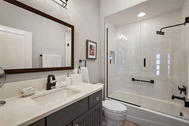 5557 Hawkins Dr, The Villages, FL 32163 - full bath featuring combined bath / shower with glass door, toilet, and vanity