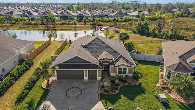 5557 Hawkins Dr, The Villages, FL 32163 - birds eye view of property featuring a residential view and a water view