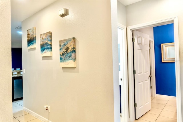 144 Primrose Dr, Davenport, FL 33837 - hall featuring baseboards, visible vents, and light tile patterned floors